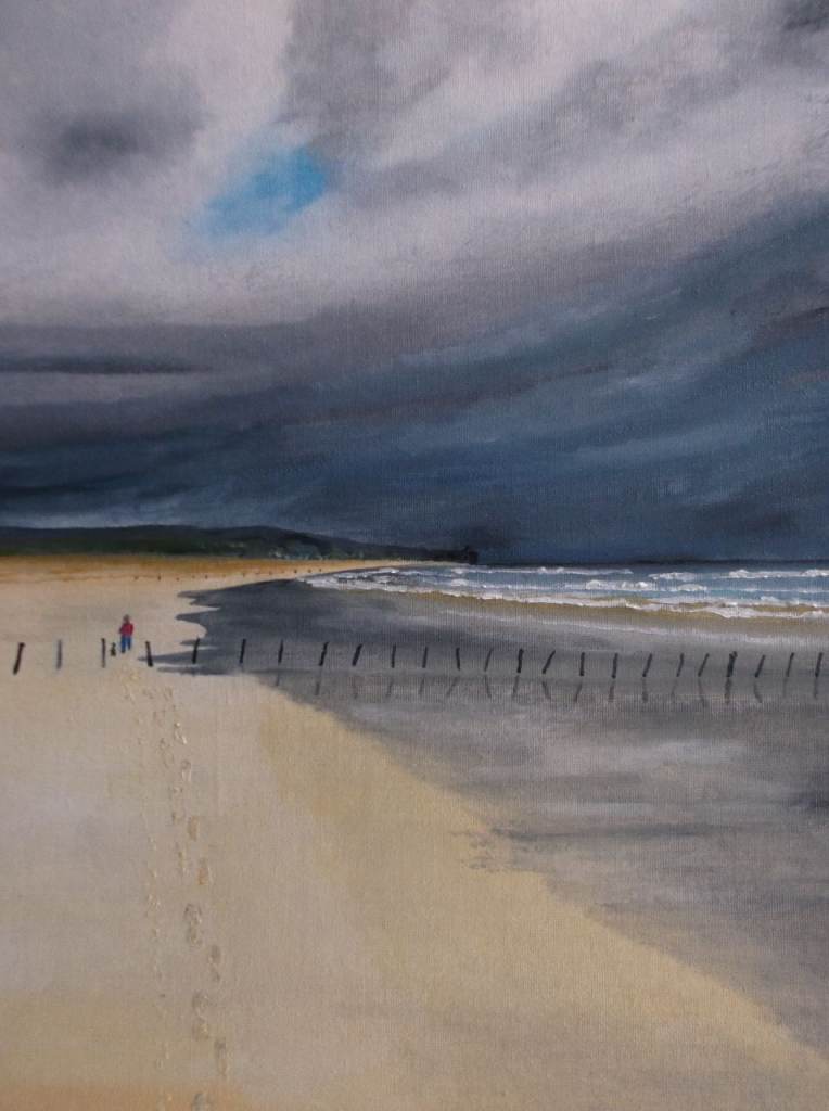 Foot steps in the sand