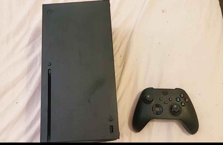 Xbox series x with one controller and wires