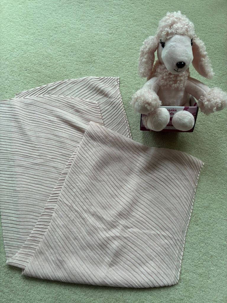 Huggable Poodle Heatie with microwaveable heat pack and pale pink scarf. New