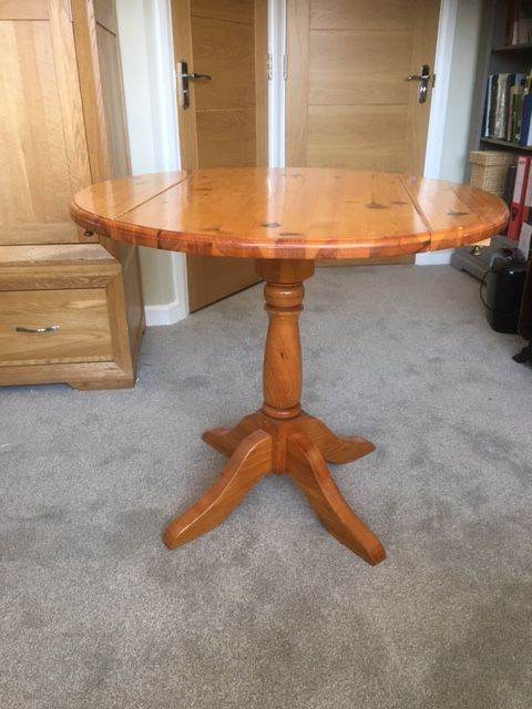 Solid Wood Dining/Kitchen Table.  Single Pedestal with Folding Leaves