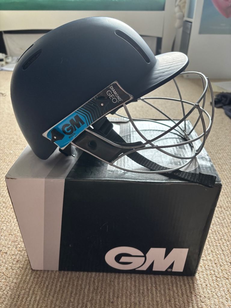 GM Junior Navy Diamond Geo cricket helmet. 