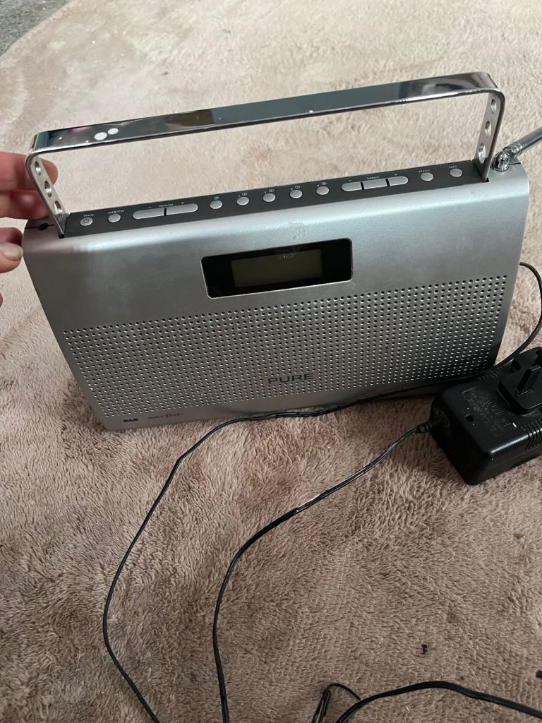 SILVER RADIO IN GOOD WORKING ORDER