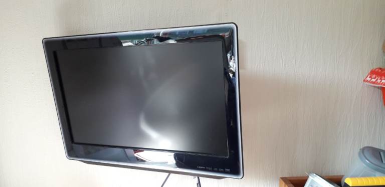 Wall mounted Toshiba television 