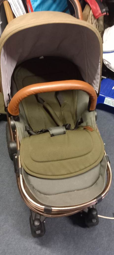 Woodland green pram .