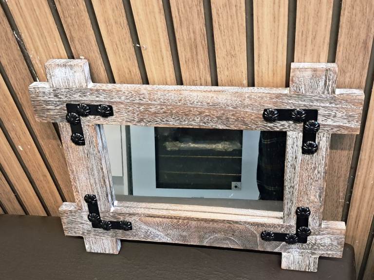 This item appears to be a rustic farmhouse-style wall mirror