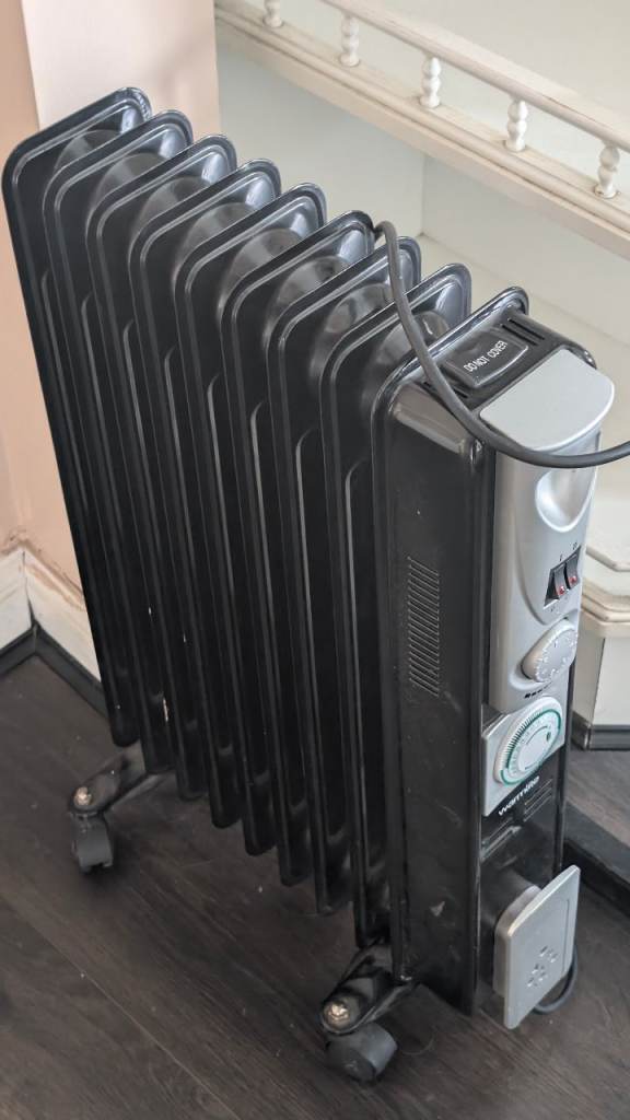 free scrap metal, oil filled radiator and metal clothes prop pole.