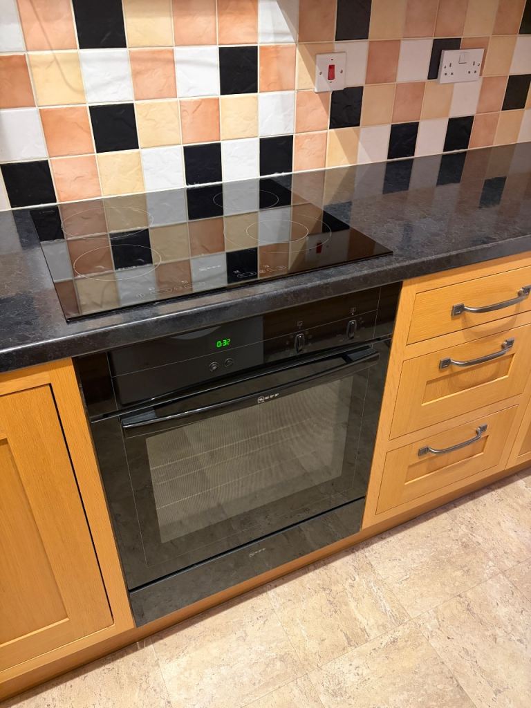 Neff oven and hob, with hot plate pull out