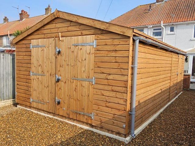 TIMBER GARAGE/WORKSHOP/HEAVY DUTY ERECTED FOR FREE