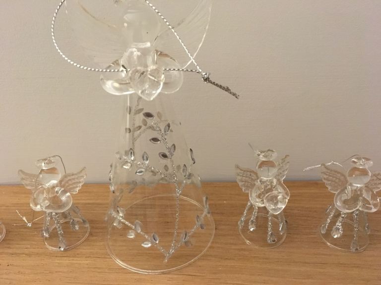 New Set of Angels. 1 large and 6 small.  With crystal decorations.   Brand new 