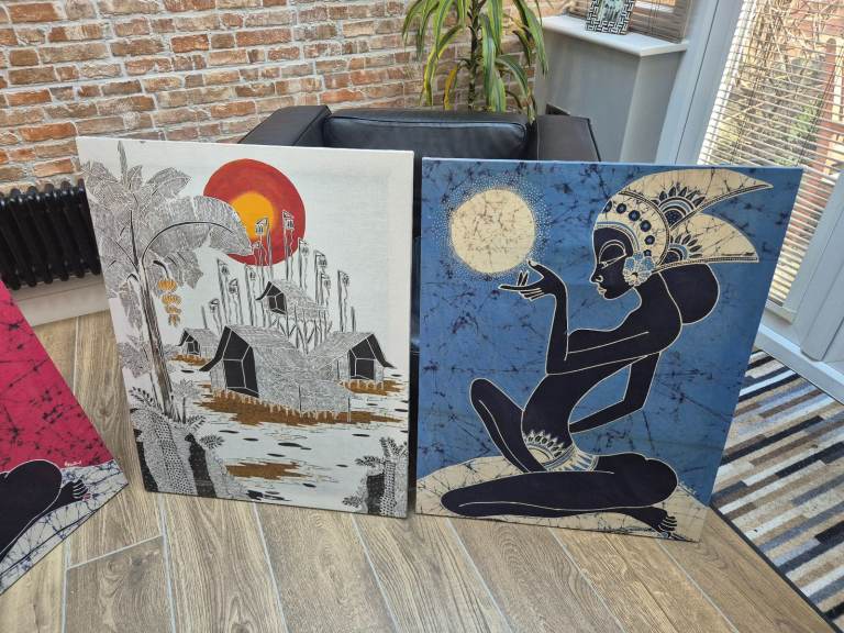 Four batik pictures on wooden frames