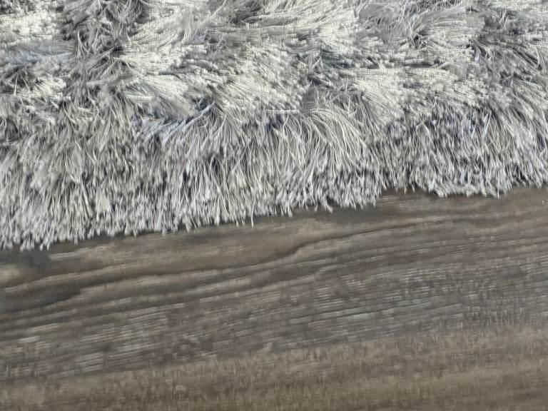 Grey silver thick shag pile rug