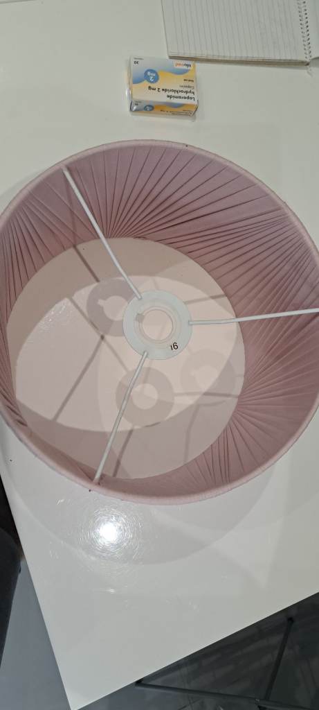 Celling or lamp shade. Pink fabric