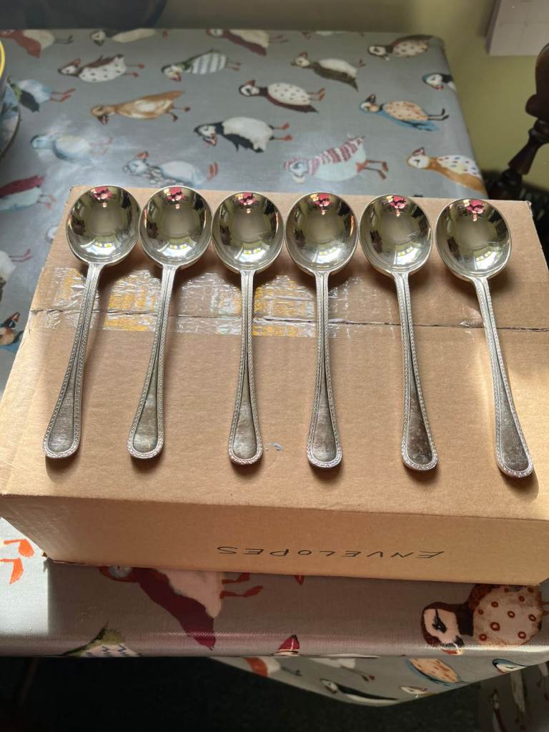 Six early 20th century identical soup spoons made by Mappin & Webb of Sheffield.