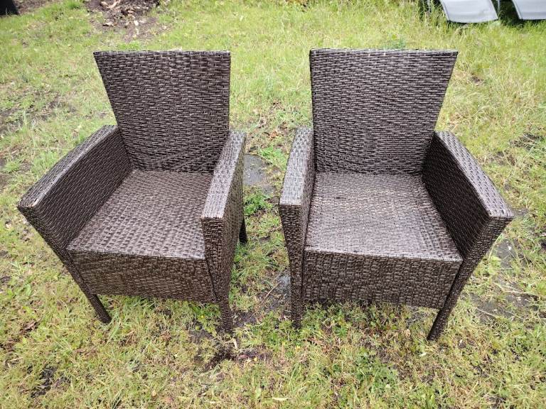 Lovely brown rattan armchairs patio garden