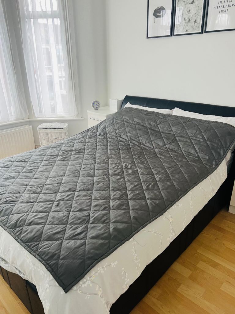 Grey quilted throw