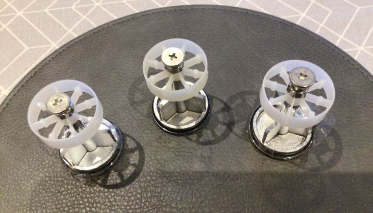 THREE CHROMED POP-UP WASTE PLUGS