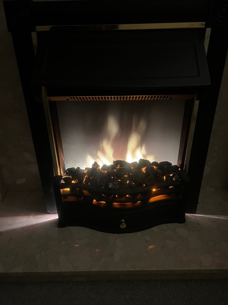 fireplace surrounds with marble backing and lined oak mantle  and hearth.