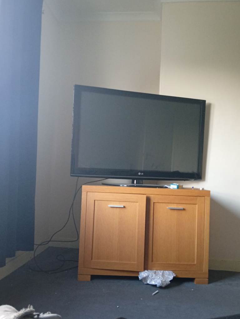 50 inch TV and unit 60 pound take both 