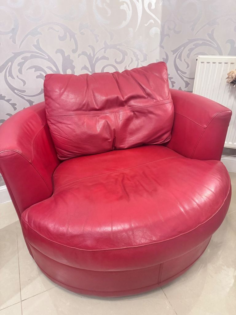 Red Leather Swivel Armchair – Good Condition