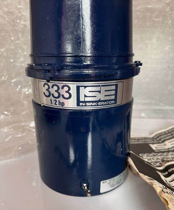 Insinkerator model 333 1/2HP new old stock in really tatty box