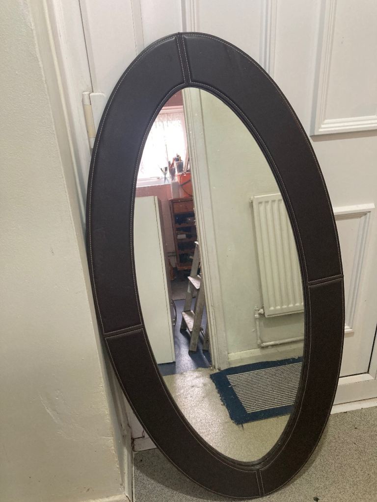 Leather oval mirror