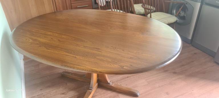 Ercol Dining Table with Four Matching Chairs – Good Condition