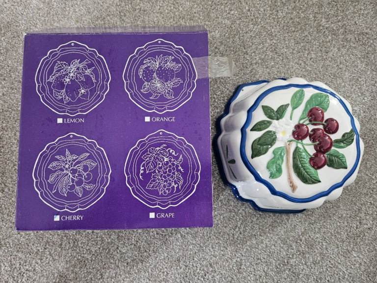 Selling a new decorative ceramic Jelly Mould Cherry (8 inches).
