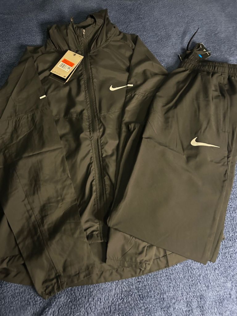 Nike tracksuit in black size M