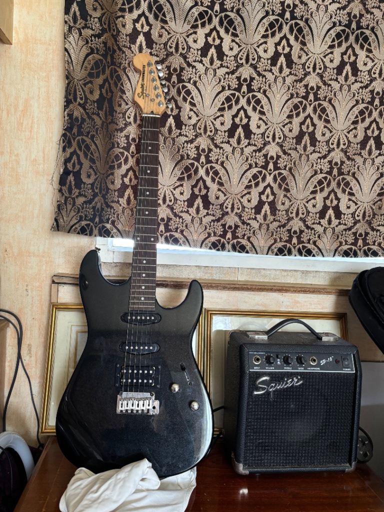 Fender squire electric guitar & amp 