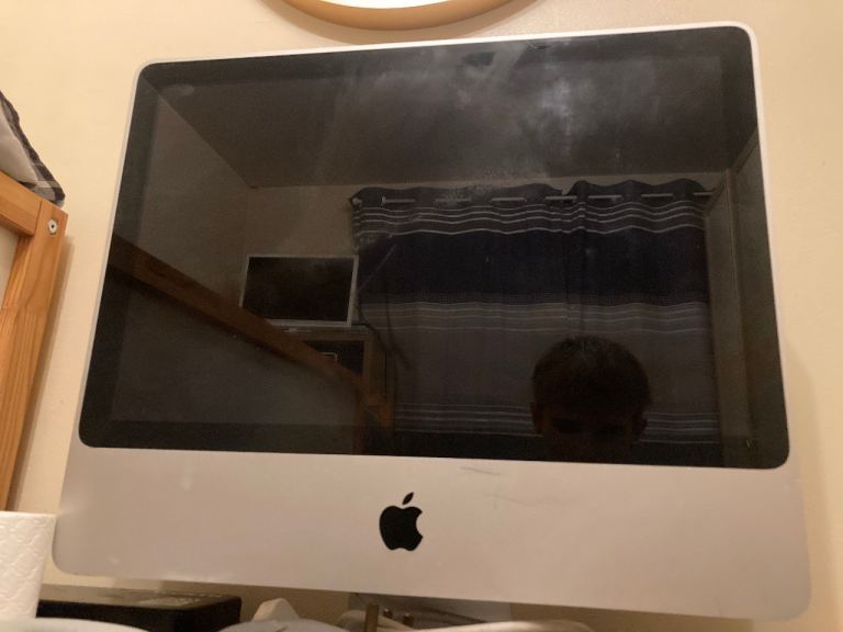 Apple Mac screen with keyboard and mouse 