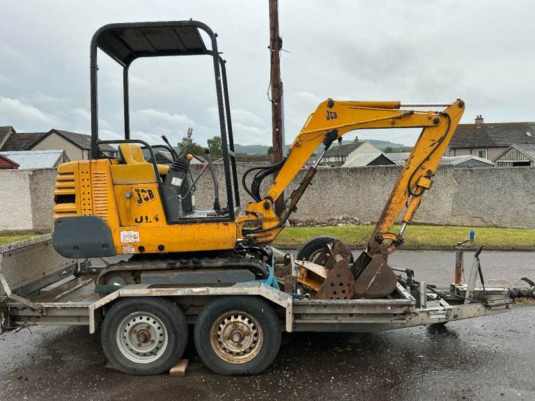mini digger and trailer