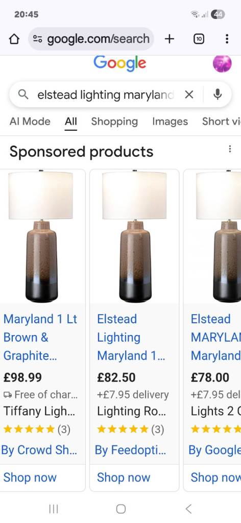 Quality lamp with white shade and 2 cream golden shades.  Almost new