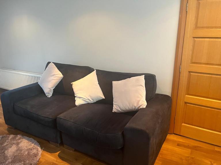 Blue three seater sofa