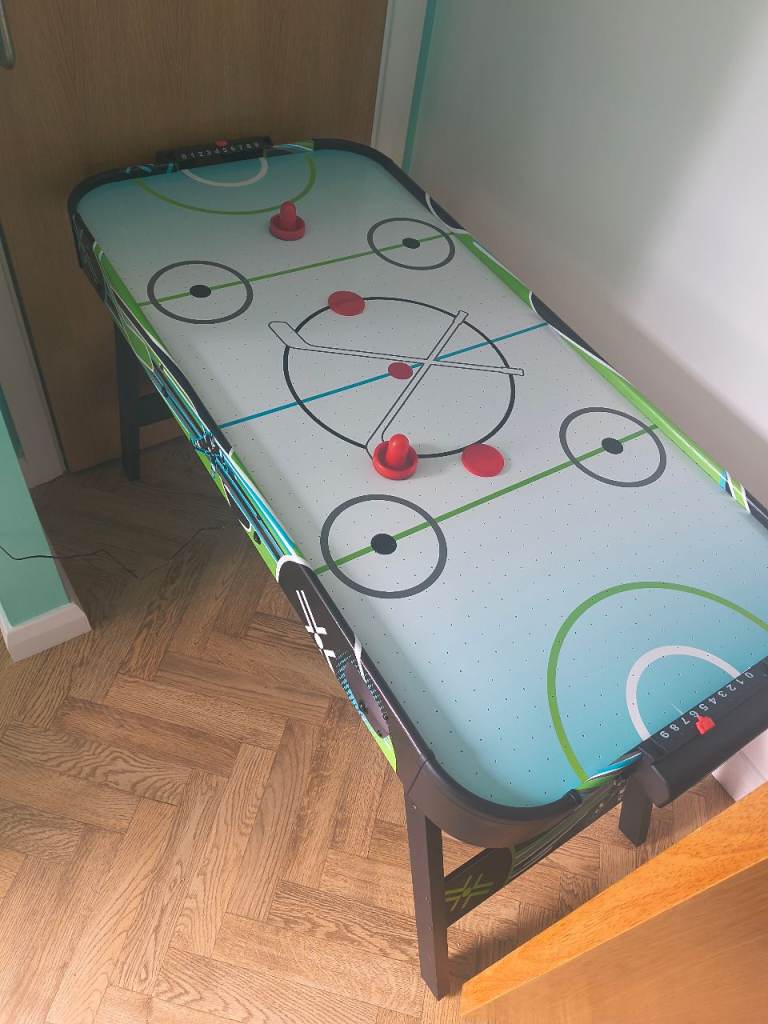 Air hockey table. 