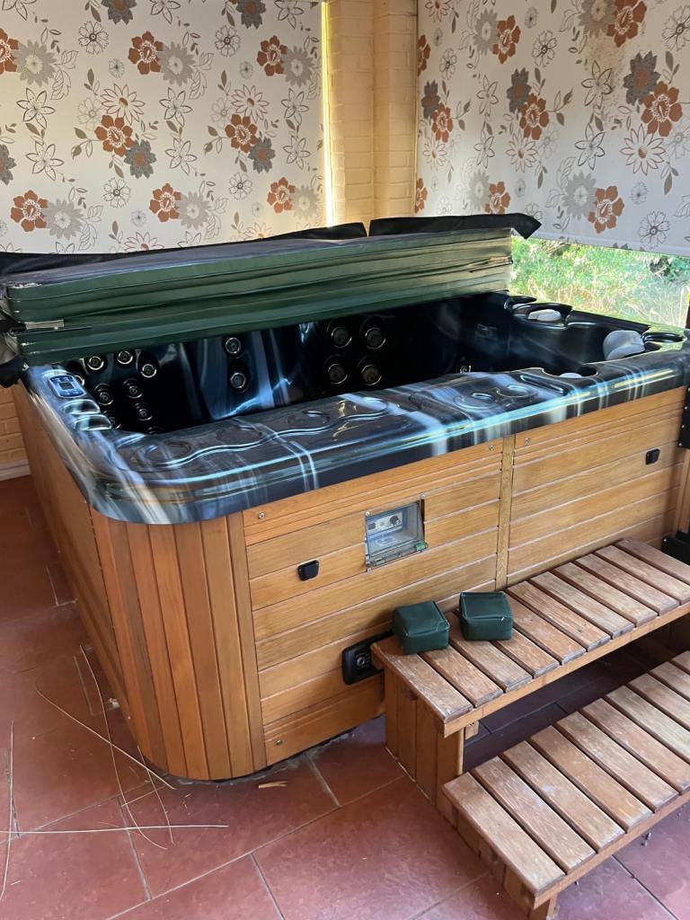 Hot Tub with Wooden Surround and Steps – Good Condition