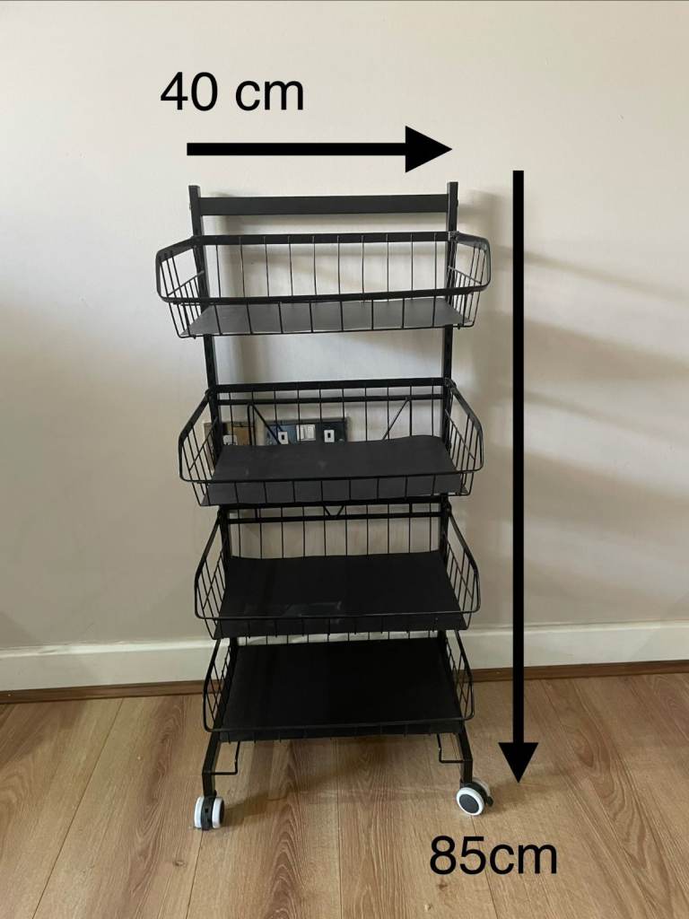 Black metal fruit trolley with wheels
