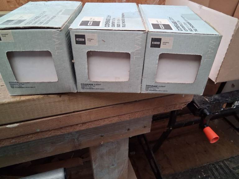 Three boxes of Homebase square white tiles