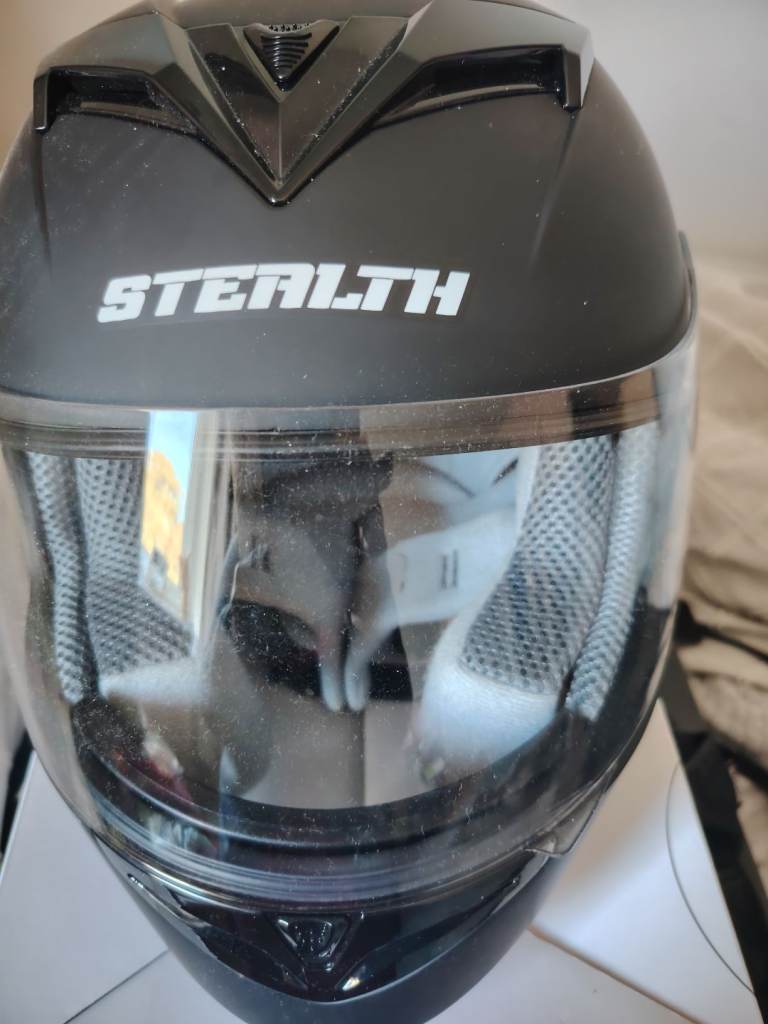 Motorcycle crash helmet and gloves 