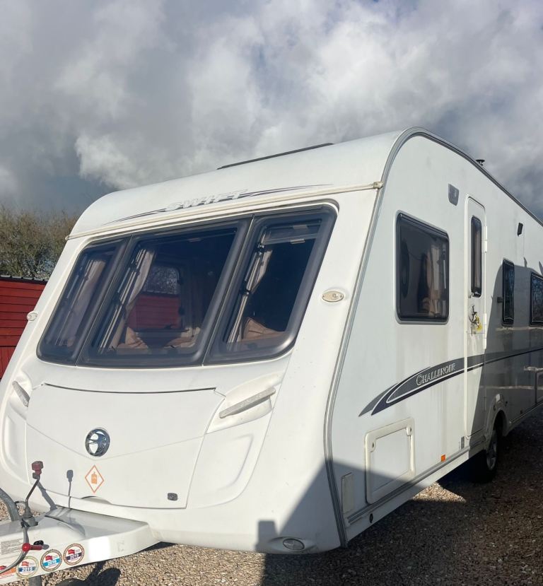 2009 caravan fixed bed Swift vgc inside and out ready to use bargain 