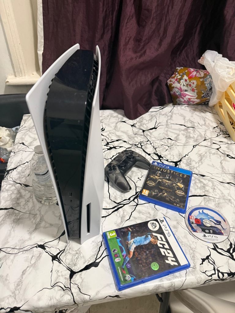 Ps5 with controller and 4 games- excellent condition 