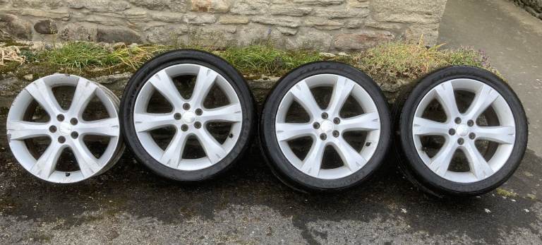4 Alloys and 3 Goodyear Eagle F1 tyres 215/45/17 (pcd = 100)