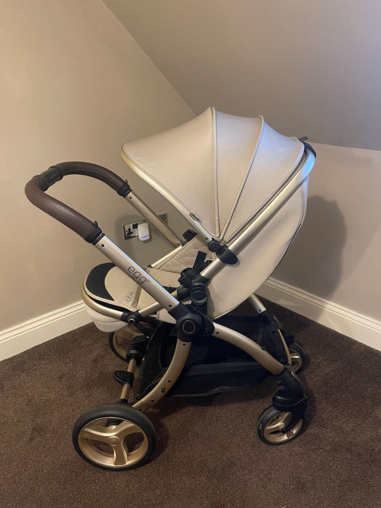 Egg pram, pushchair, car seat and  rain cover 