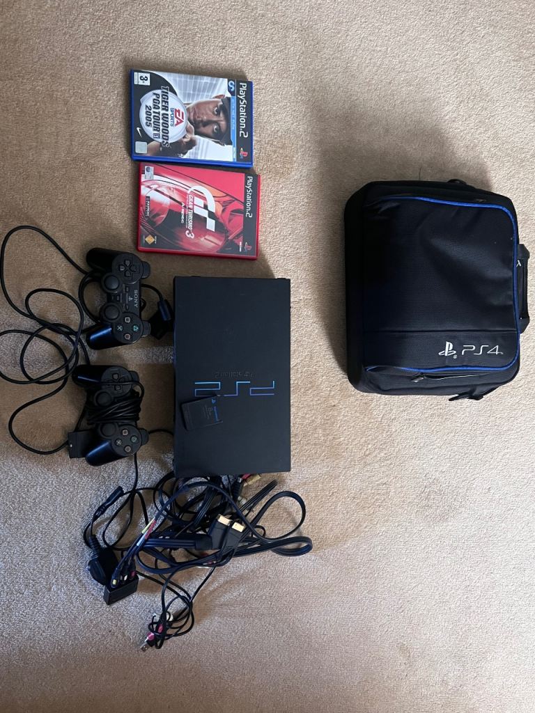 Sony PlayStation 2 Consolewith Games and Bag