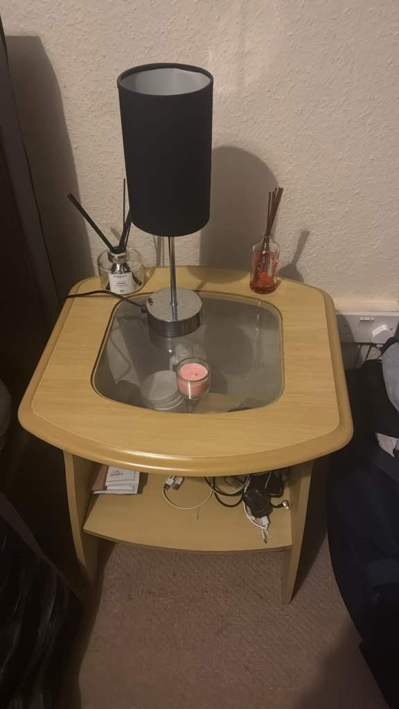 Wooden side table with glass top 