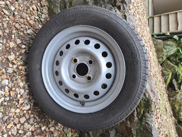 2 x TRAILER WHEELS & TYRES -  145/70 R13 4 STUD 60MM CENTRE BORE (USED ONCE)
