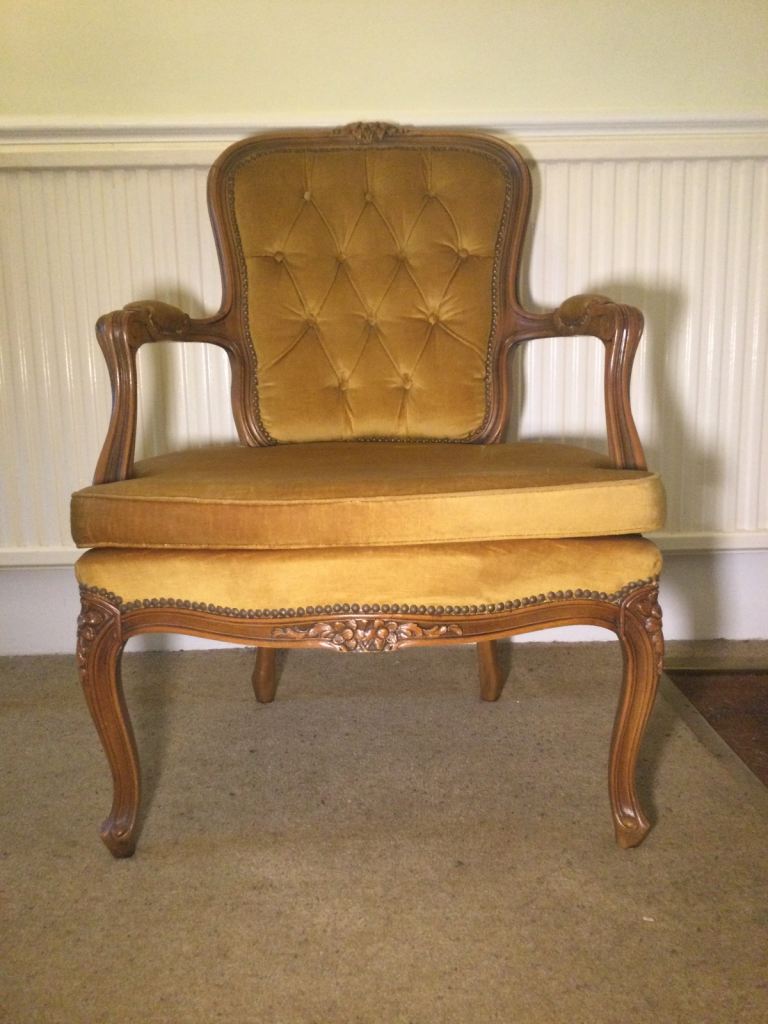 Another golden armchair