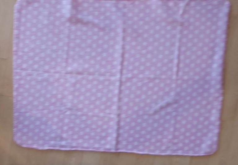 soft baby pink polka dot blanket