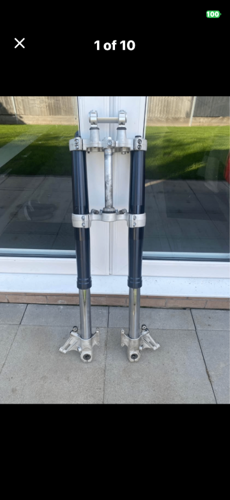 2011 KTM 990 forks complete with tree clamp and handlebar clamp. 