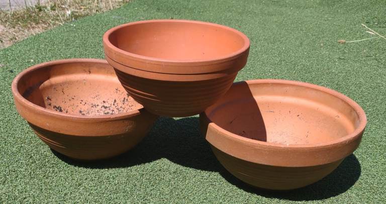 Matching set of 3 weathered vintage terracotta planters