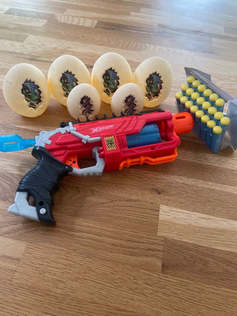 X-Shot Blaster with Foam Darts and Dino Eggs – Good Condition